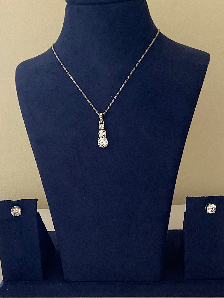 Three Solitaire Pendant with Solitaire Studs